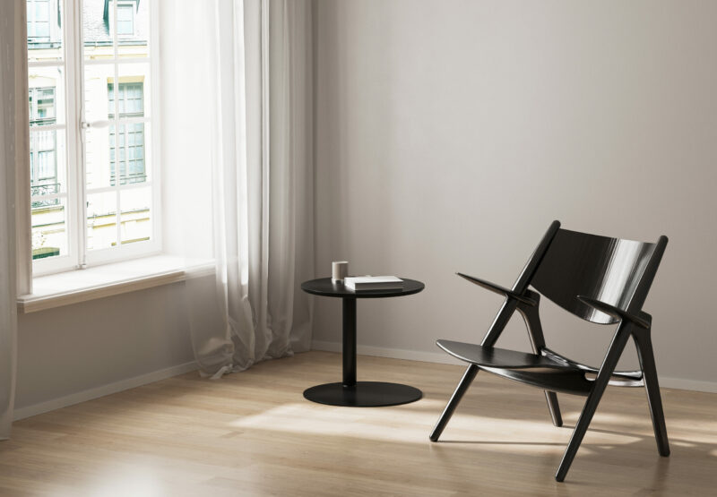 Black chair and coffee table near window with curtains, white wall, wooden floor, 3d render
